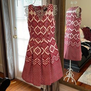 Sleeveless, box pleat dress with side pockets